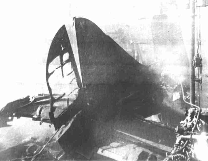 Photo of kamikaze on deck of USS Rall